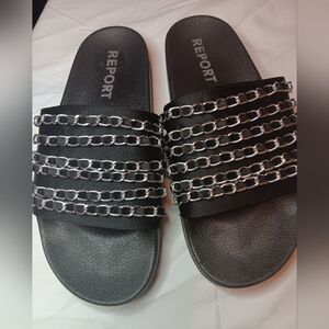 REPORT  Black slides with silver chains size 9